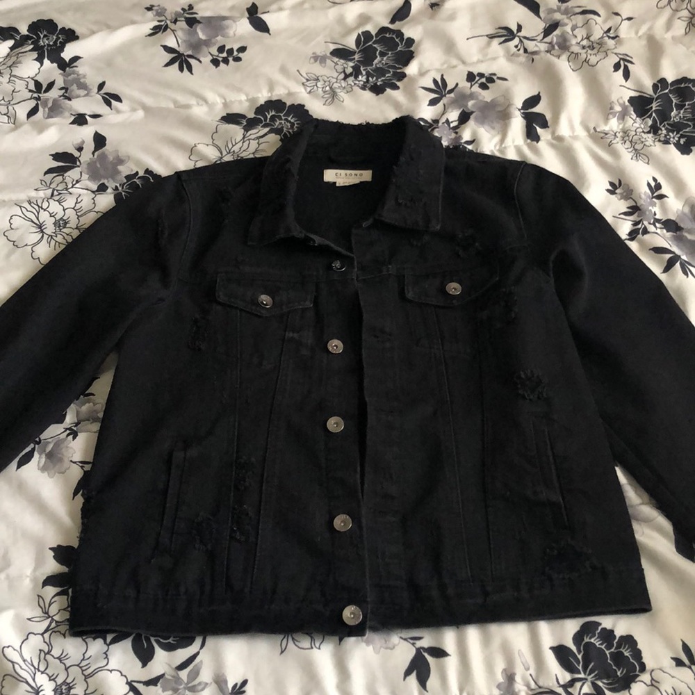 Distressed denim jacket